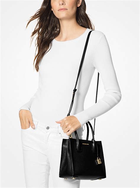 michael kors pebbled leather wristlet|michael kors medium mercer bag.